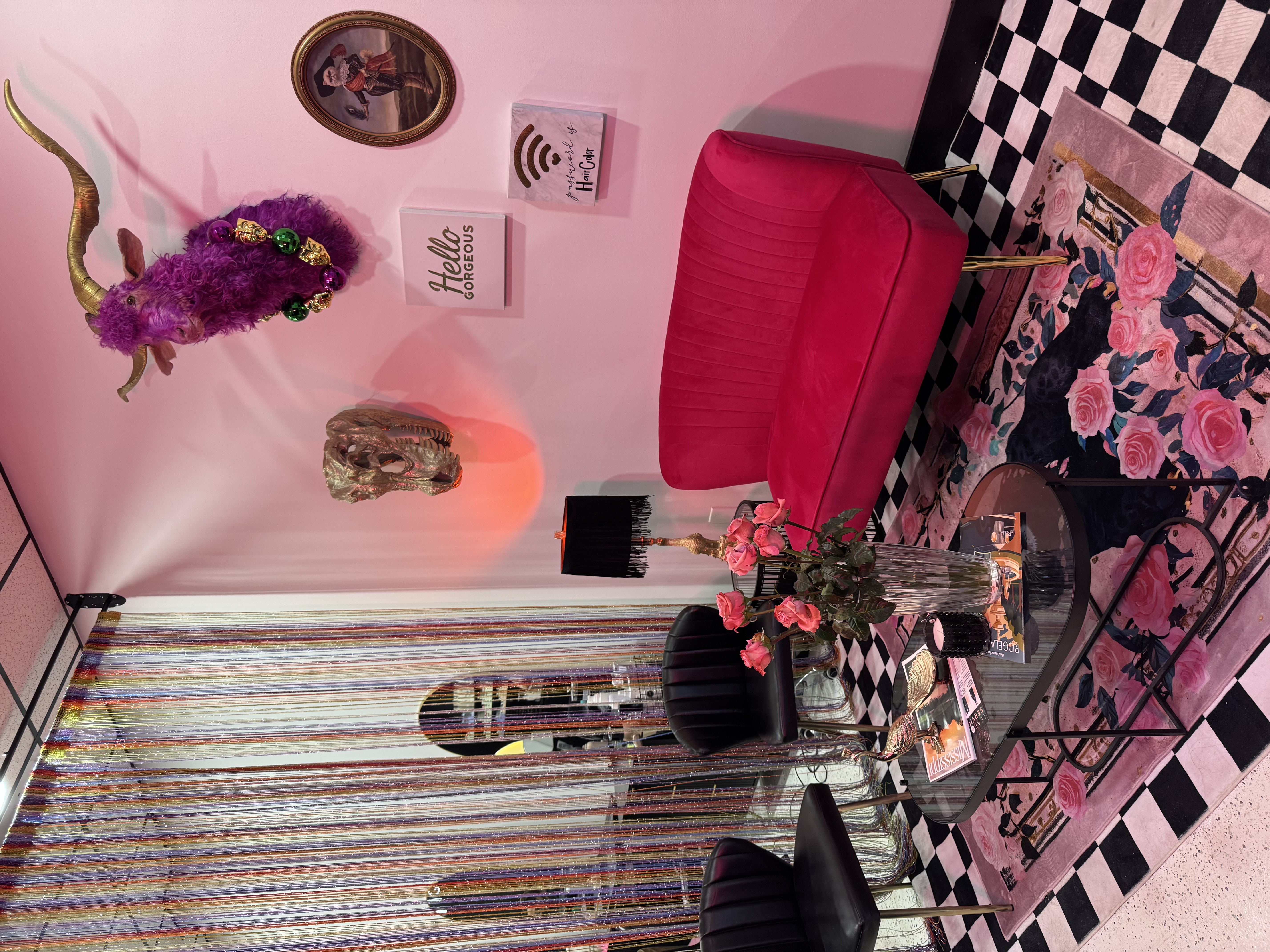 Patina Hair Studio pink lounge area